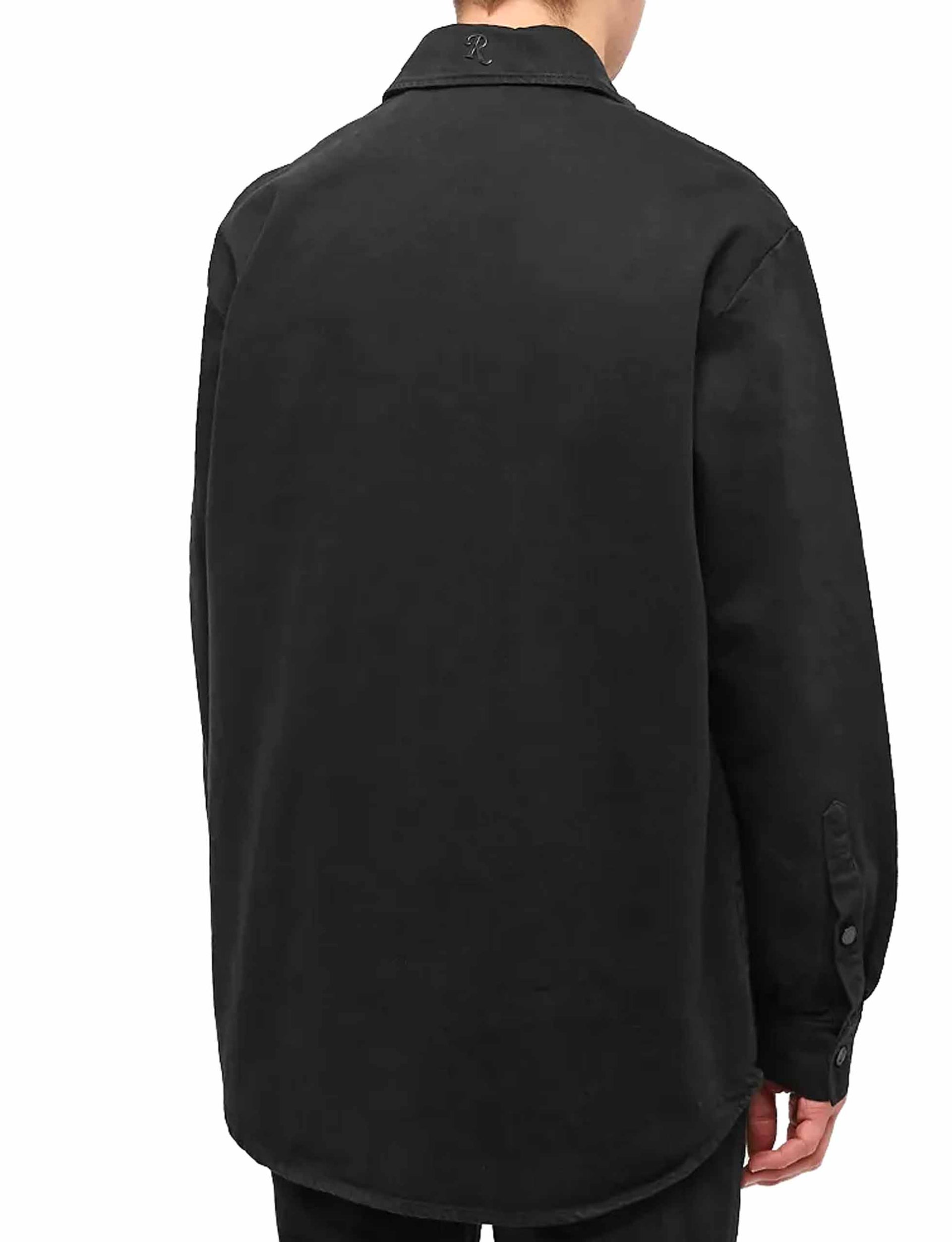 RAF SIMONS Oversized denim shirt with R pin in back