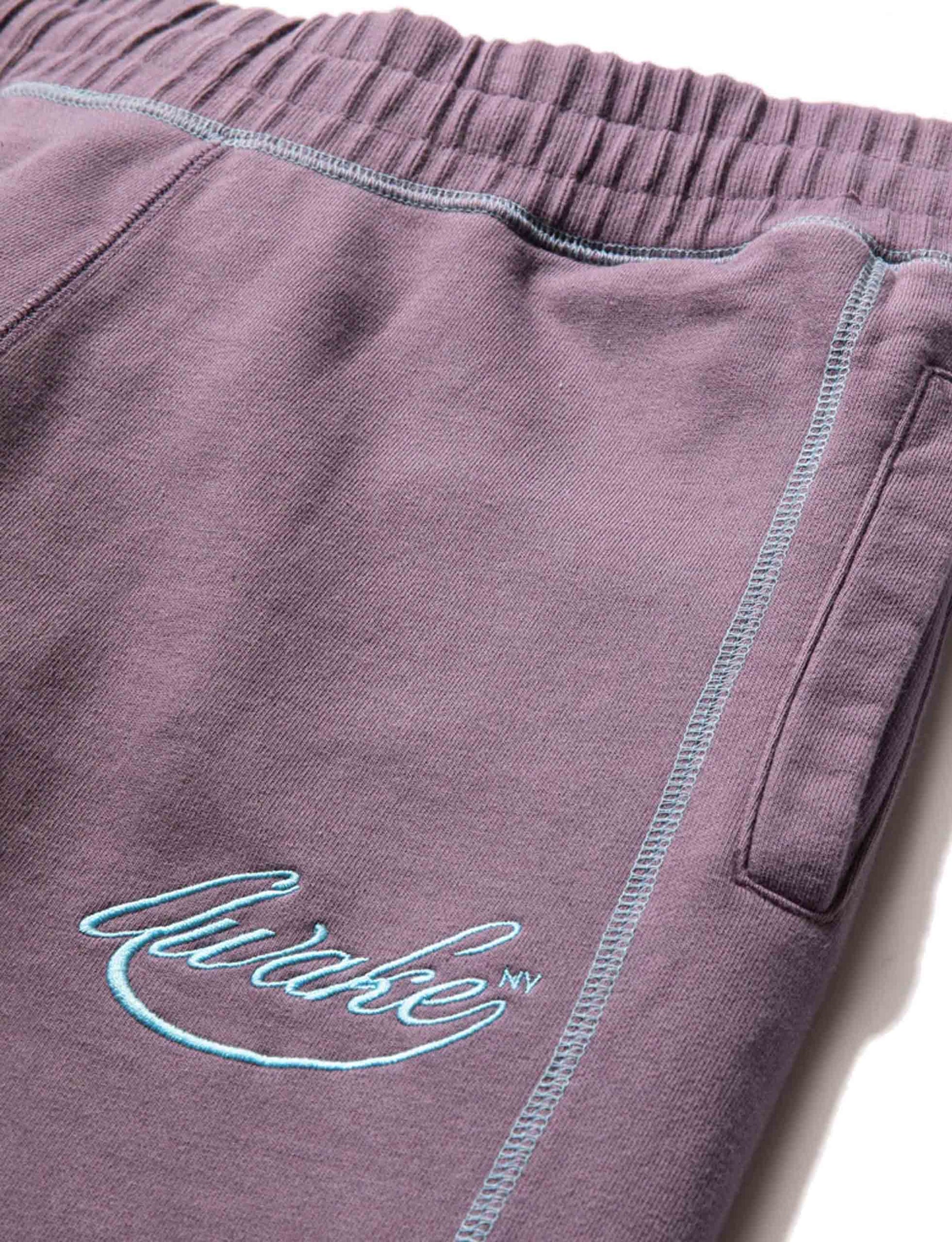 AWAKE NY CONTRAST STITCH SCRIPT LOGO SWEATPANT PURPLE